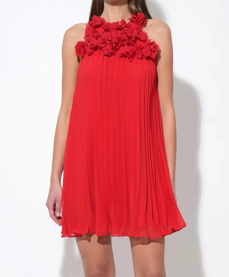red halter pleated cocktail dress with floral appliqué
