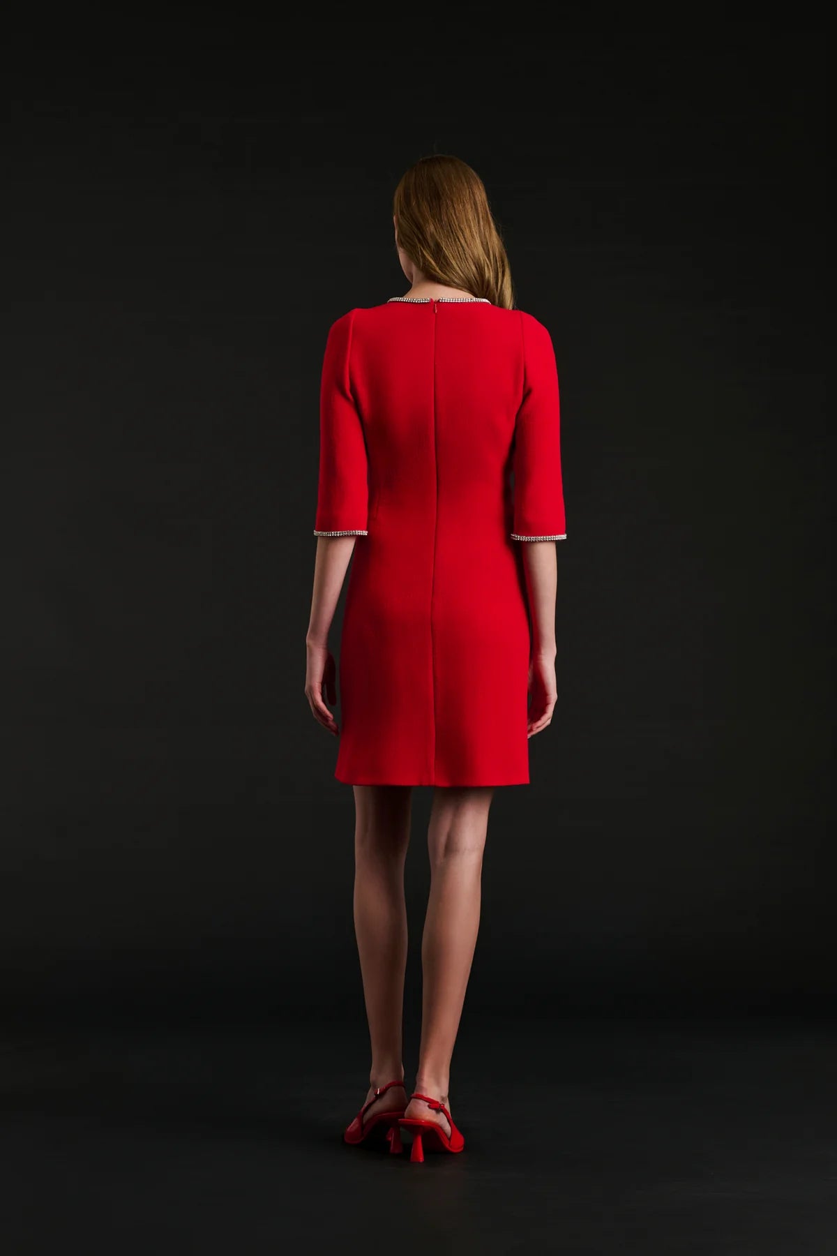 Knee-length wool crêpe dress in black adorned with rhinestones by WEILL