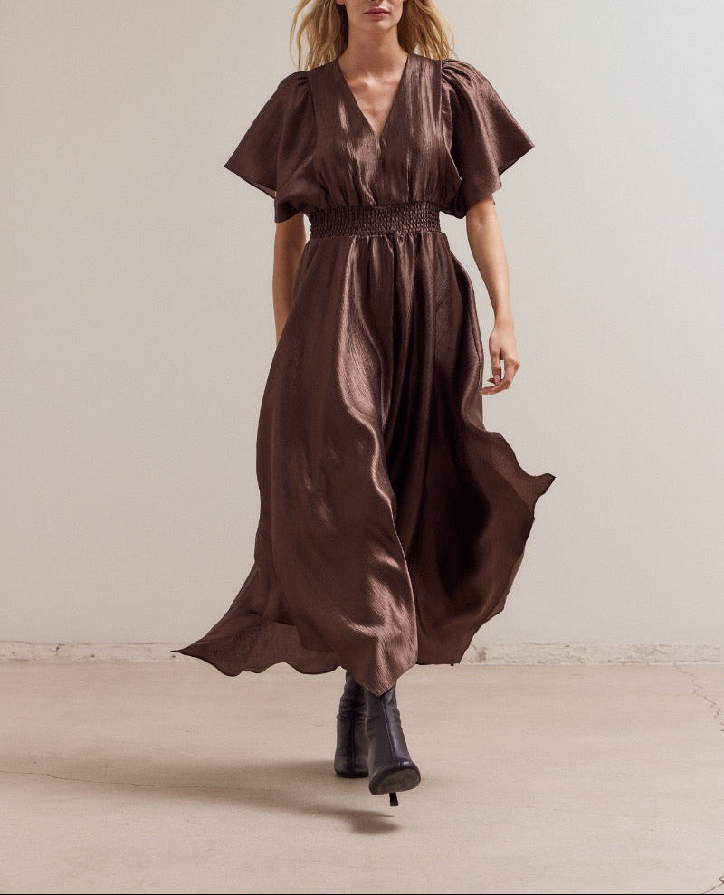 Full-length view of Dark Chocolate satin maxi dress with asymmetrical hem