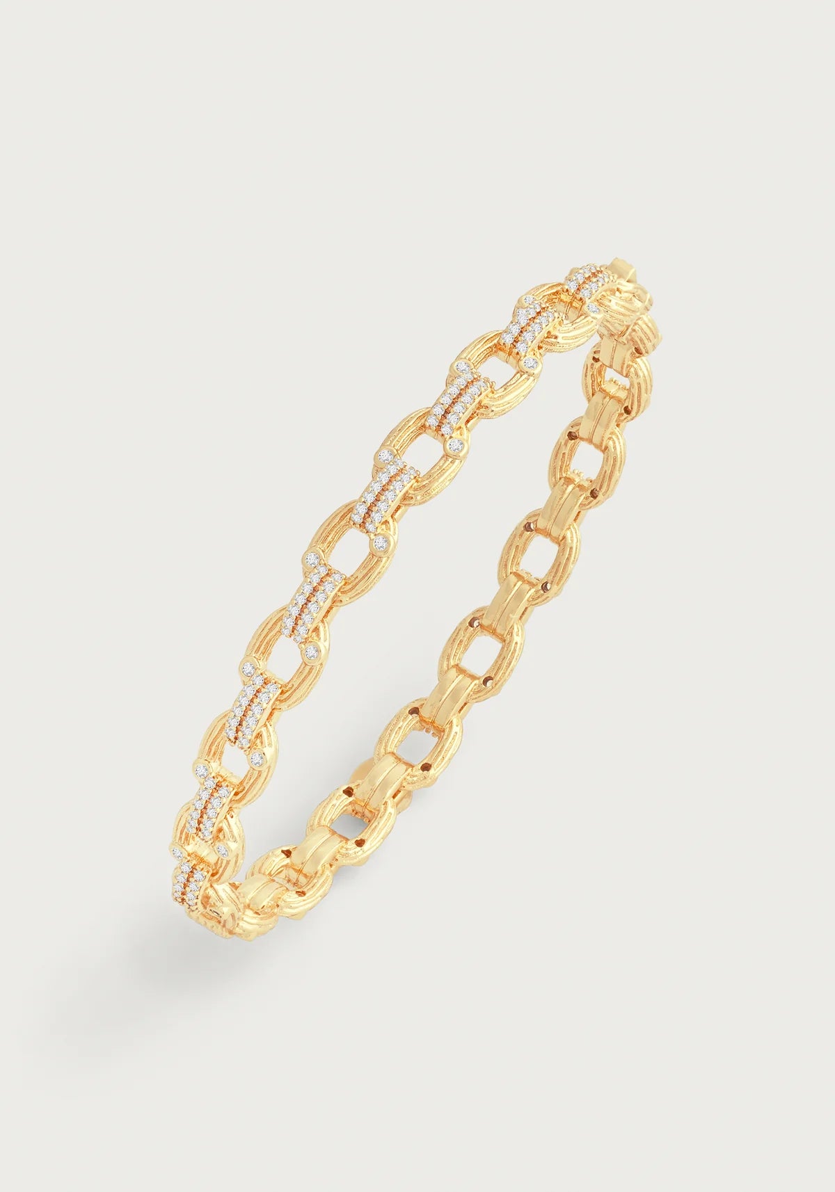 Enchanted Forest chain hinged bangle by Anabel Aram featuring interlocking gold‑plated links with crystal accents and a concealed hinge