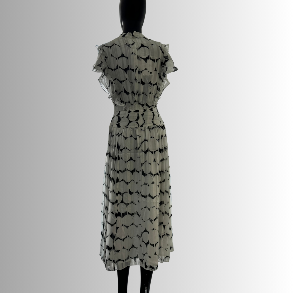 Back view of black and white chiffon midi dress with flutter sleeves by Nora Noh
