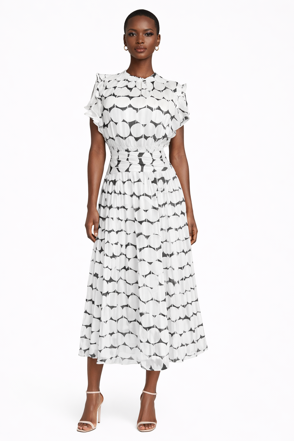 Black and white abstract print midi dress styled for elegant daytime occasionwear