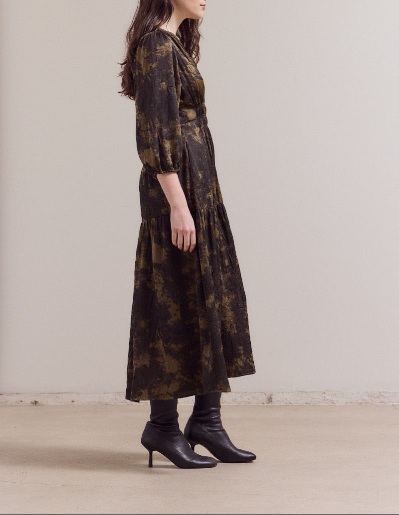 Side view of printed midi dress with pockets