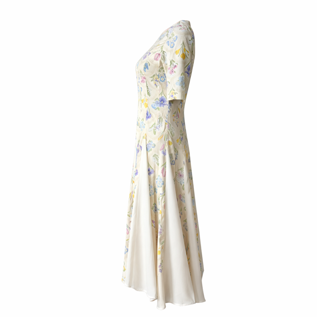Side view of yellow floral fit-and-flare midi dress with elbow sleeves by Nora Noh