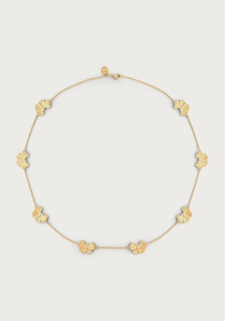 Gold butterfly station necklace in 18K gold-plated brass on white background