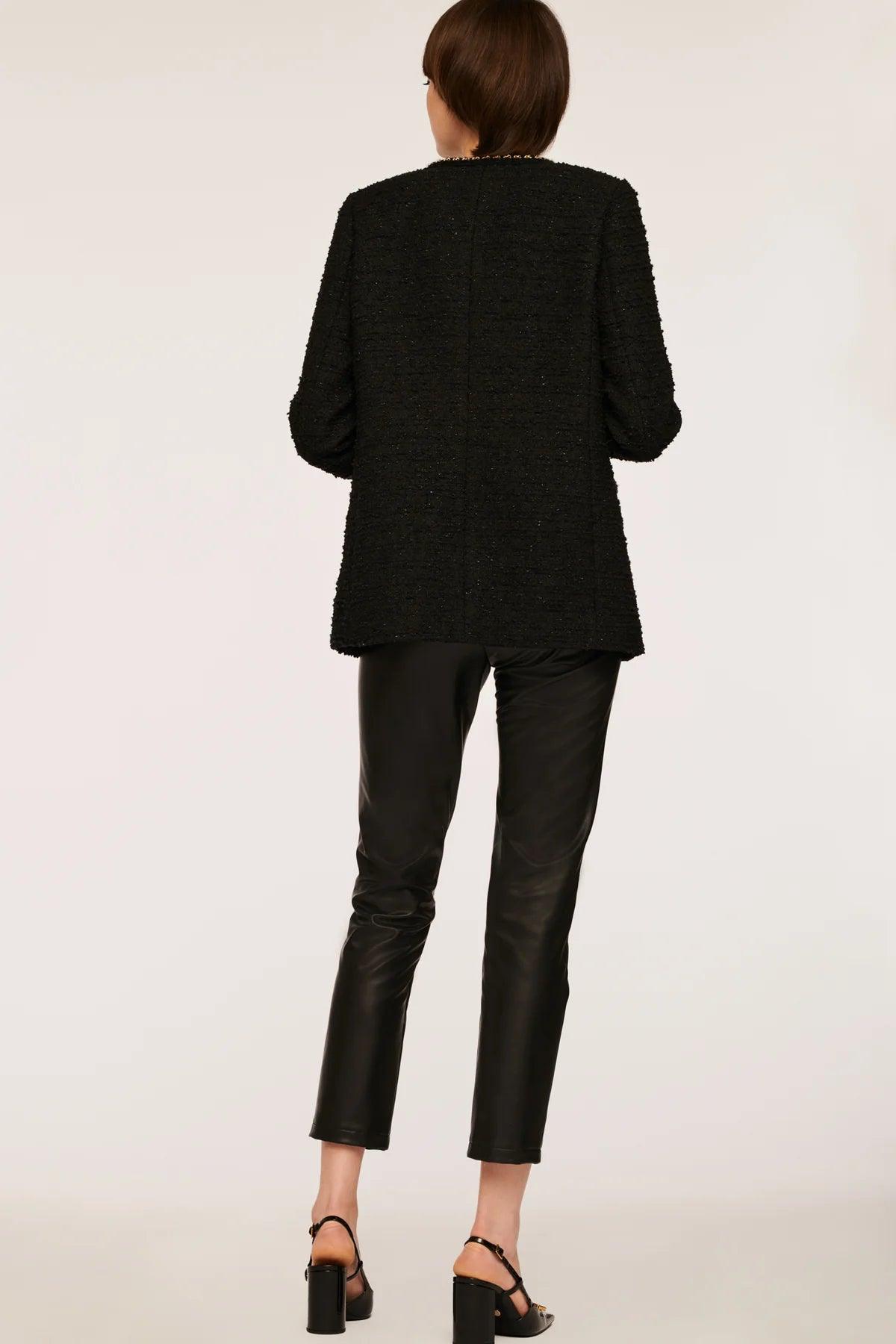 Back view of women’s black textured tweed jacket with long sleeves by Weill Paris