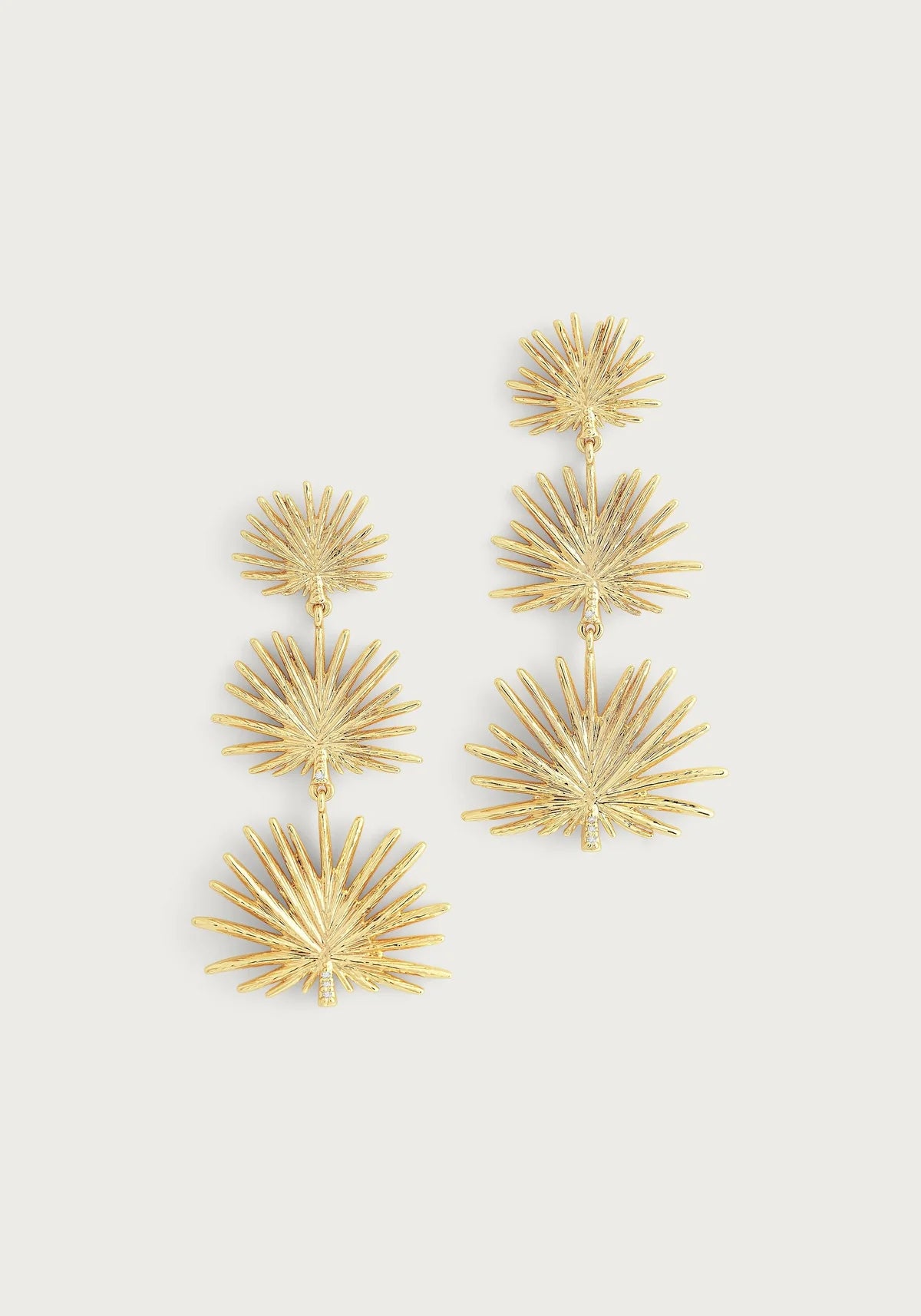 Small Triple fan palm dangle earrings by Anabel Aram featuring three gold‑tone, hand‑sculpted fan leaves with crystal‑adorned stems.