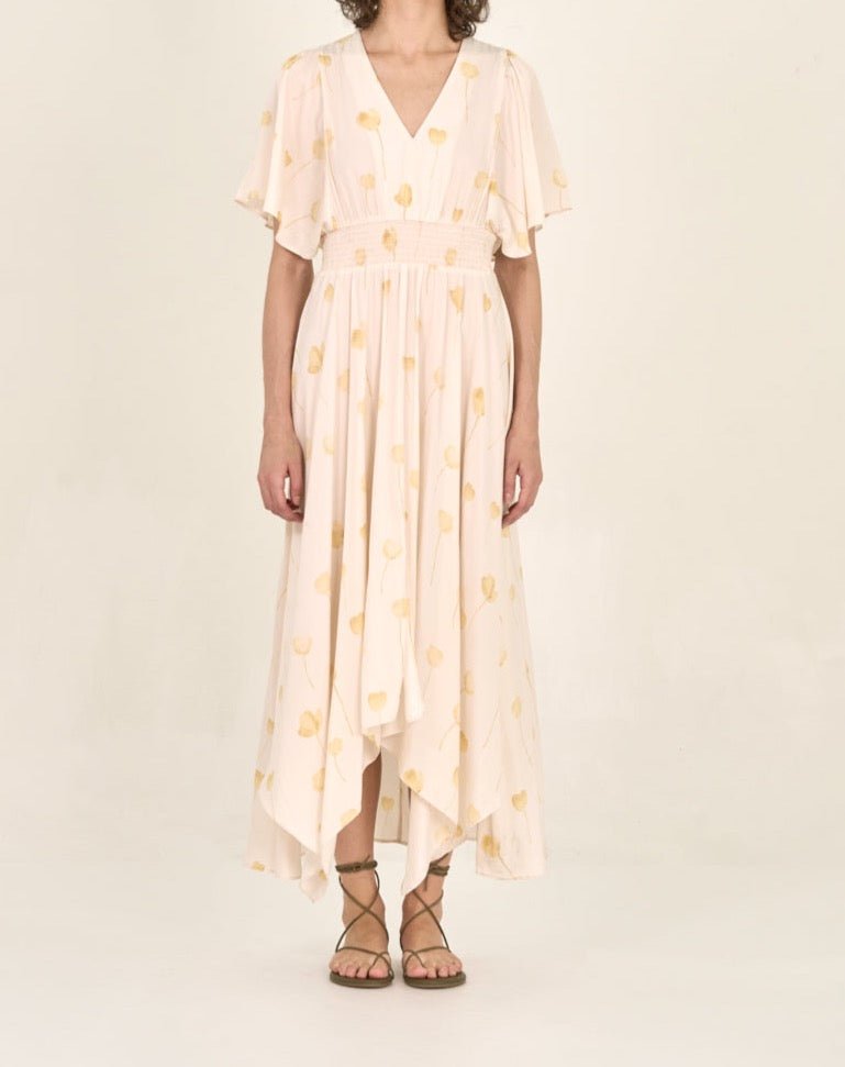 Watercolor floral maxi dress with flutter sleeves and asymmetrical hem front view