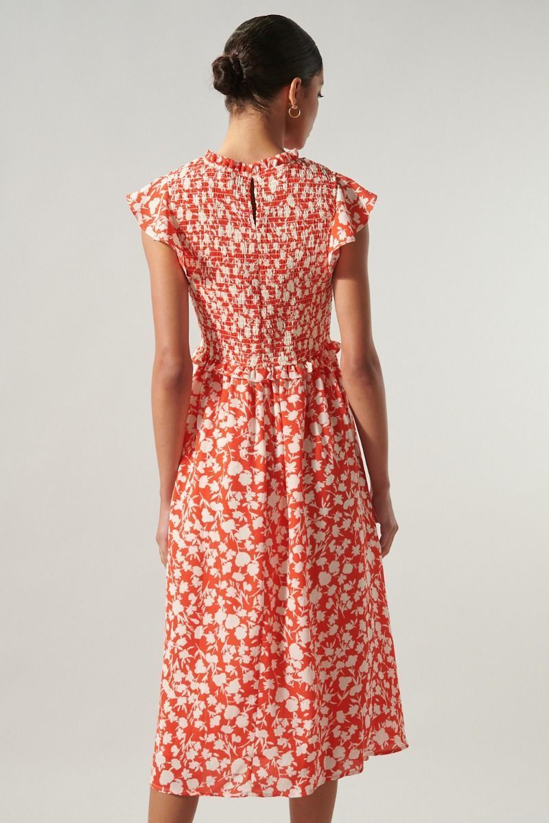 Back view of cherry red floral midi dress with smocked back bodice and keyhole detail