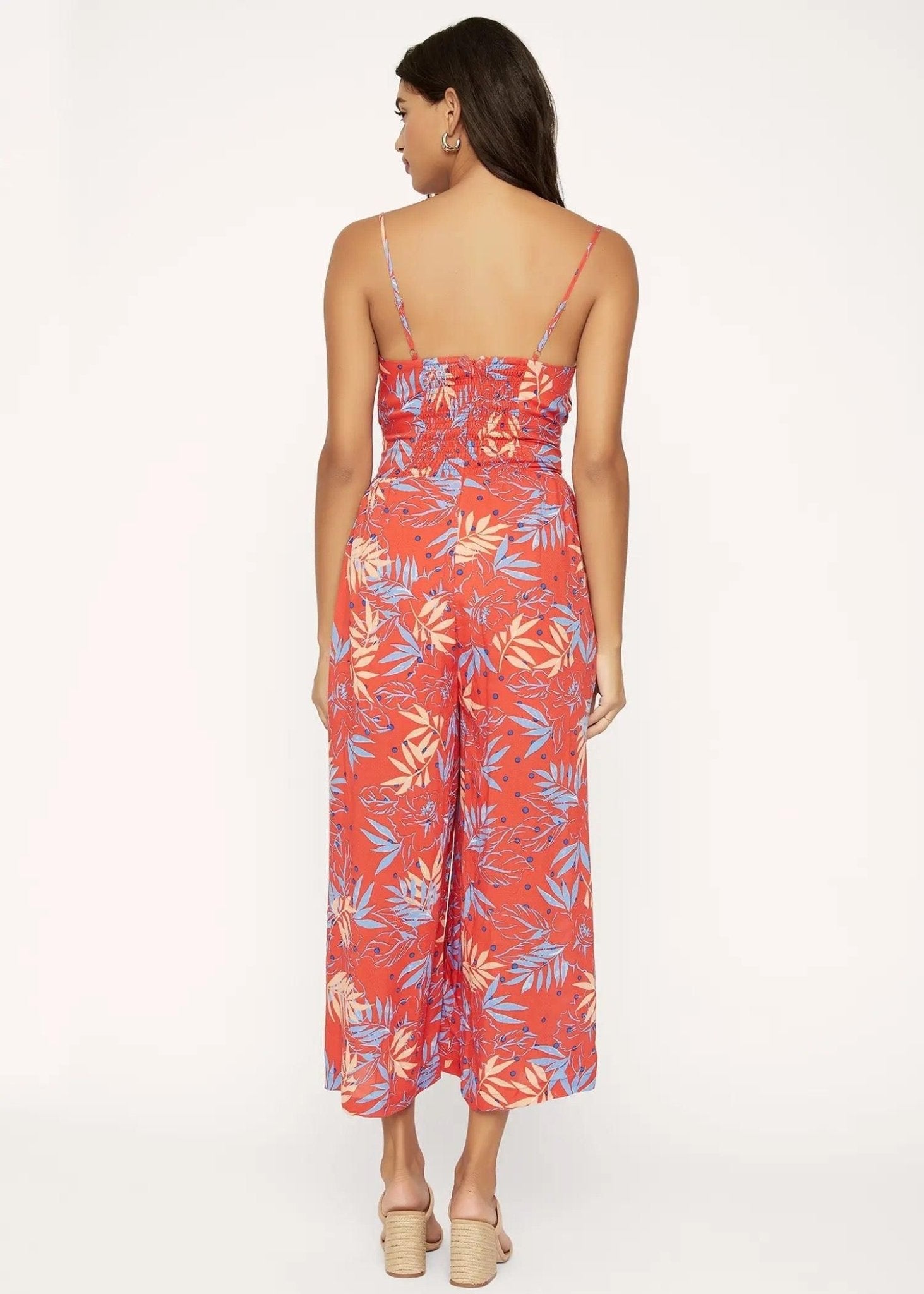 Back view of Still on Vacay Jumpsuit showing spaghetti straps and relaxed wide-leg fit