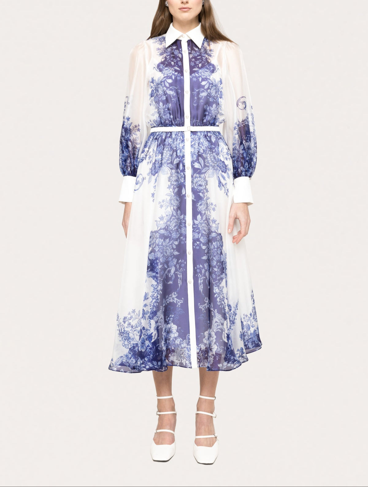 Blue and white floral organza midi dress with long sleeves and defined waist for wedding guest