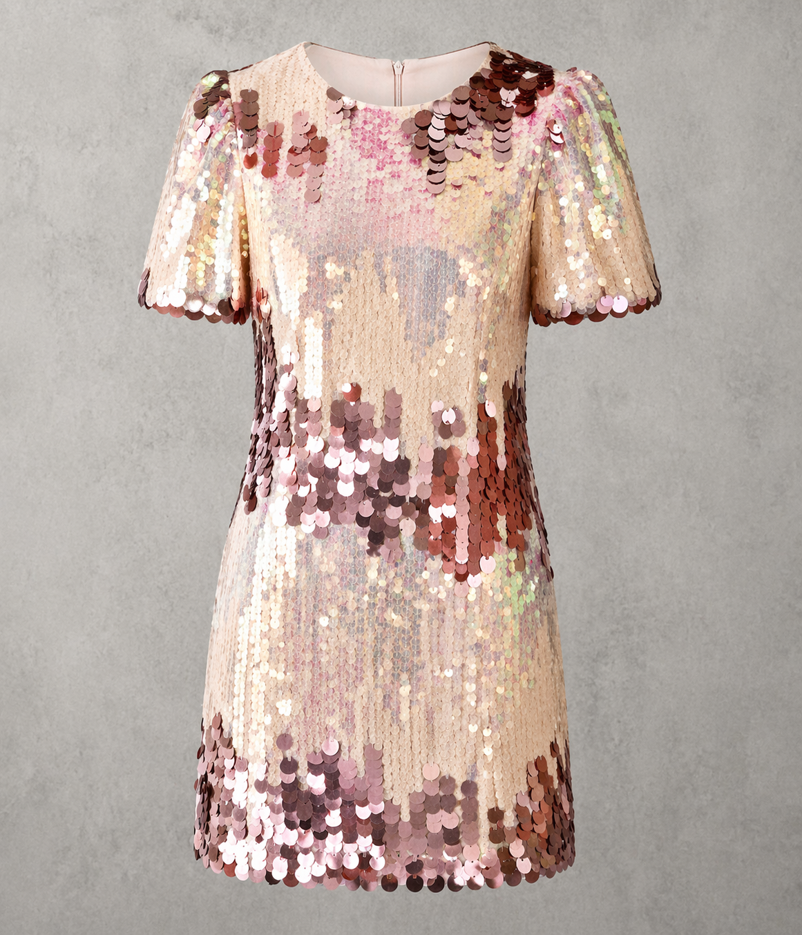 Close-up of blush champagne and rose gold oversized paillette sequins on Verona mini party dress