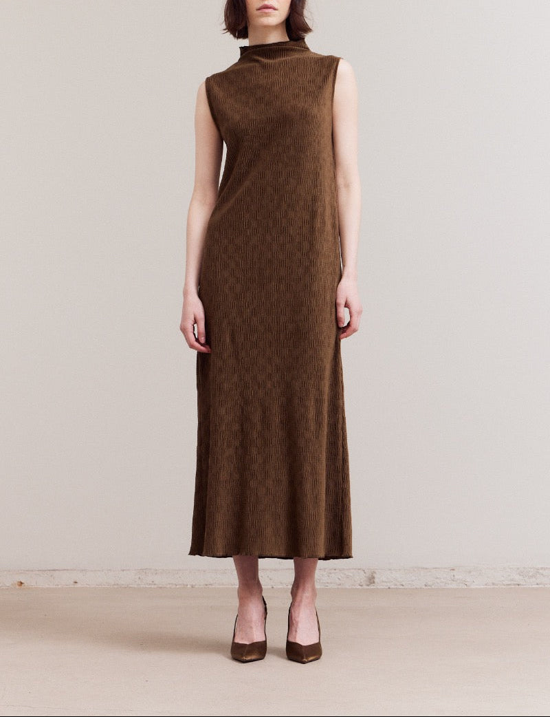 Full‑length front shot of a dark moss crinkled velvet sleeveless mock‑neck midi dress with a straight column silhouette.