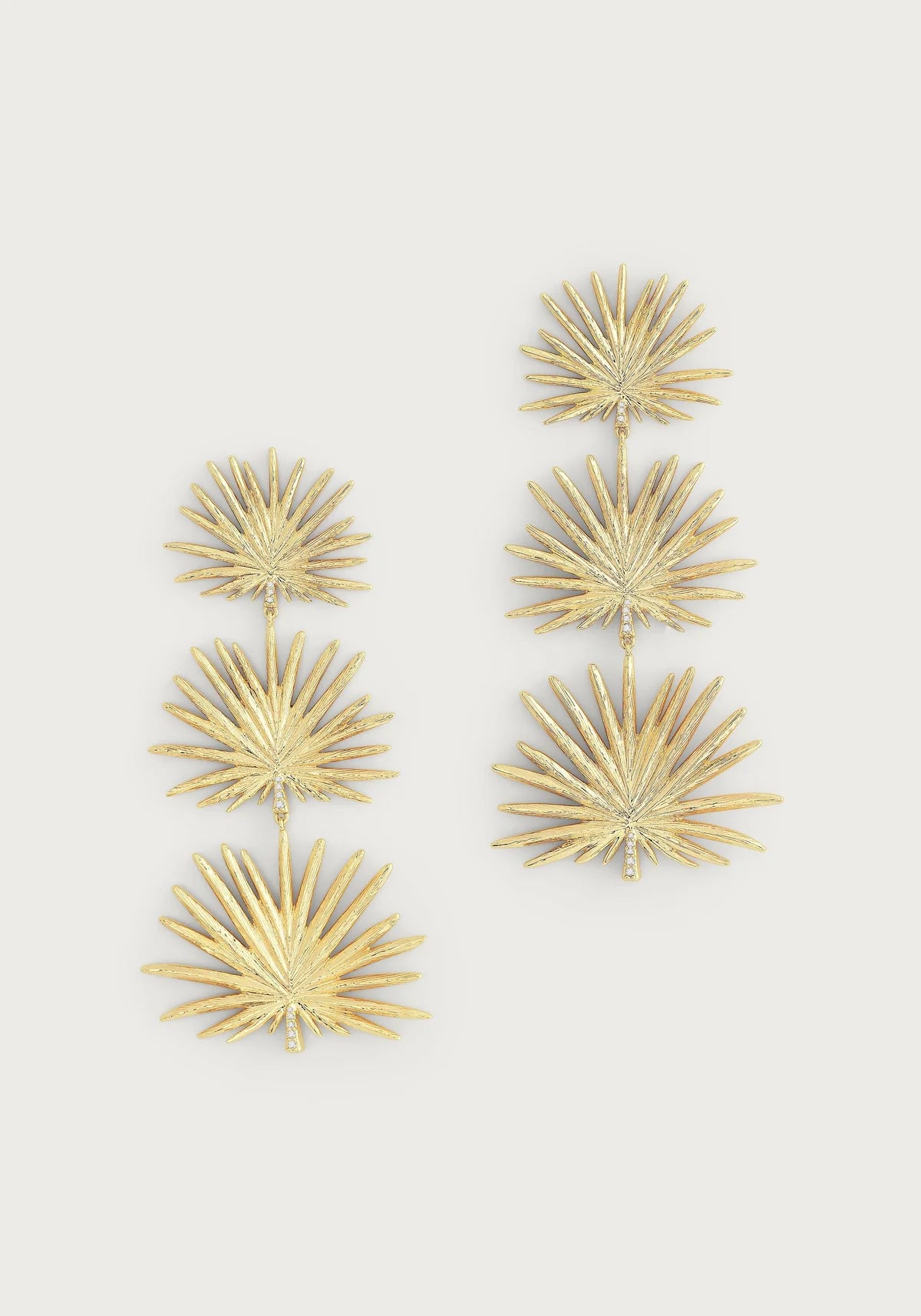 Large Triple fan palm dangle earrings by Anabel Aram featuring three gold‑dipped, textured palm leaves with hinged segments and crystal‑accented stems