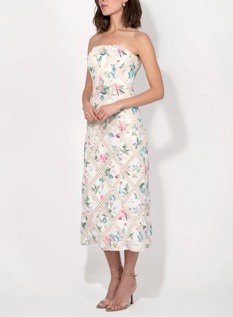 Side angle of Adelyn Rae cream floral strapless midi dress with crochet-inspired print