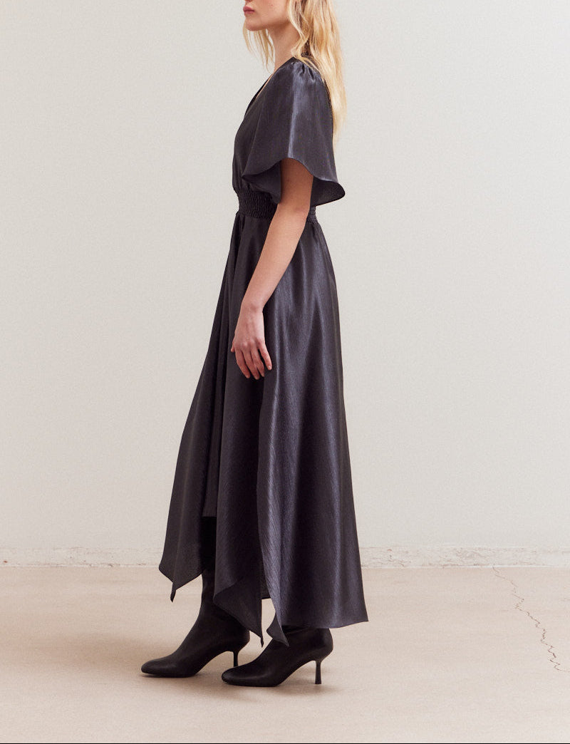 Side view of Midnight flutter sleeve satin maxi dress with smocked waist