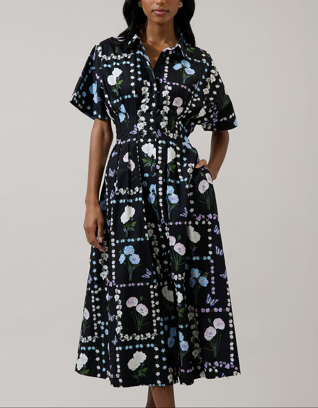 Wilderra Trevis Floral pleated midi shirt dress in black pastel, front view with collar and short sleeves