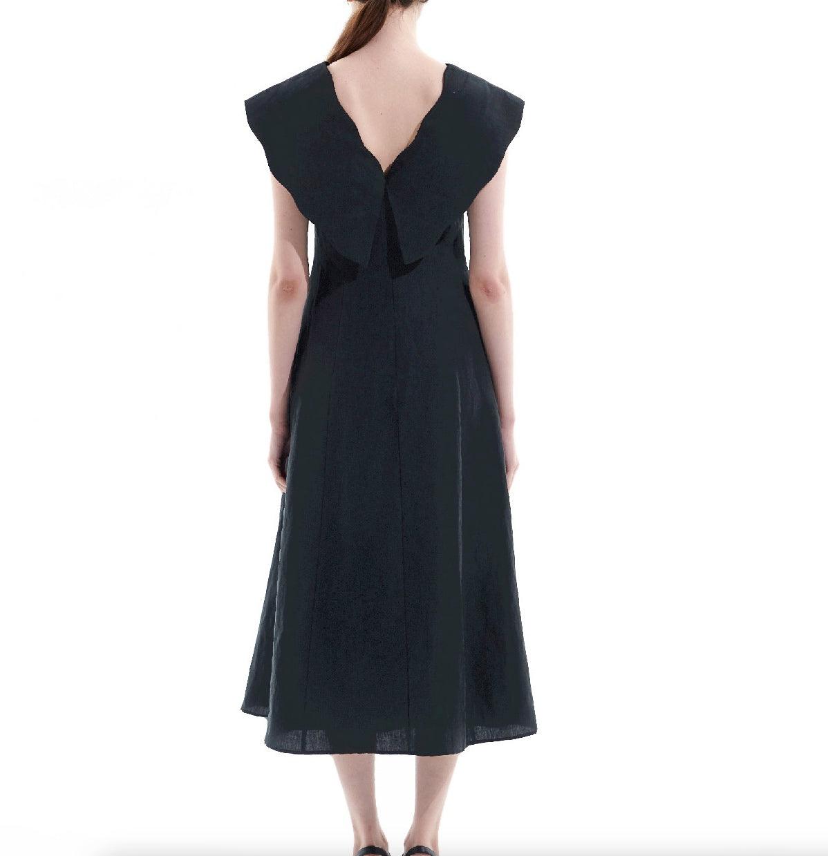 Back view of relaxed fit black linen midi dress