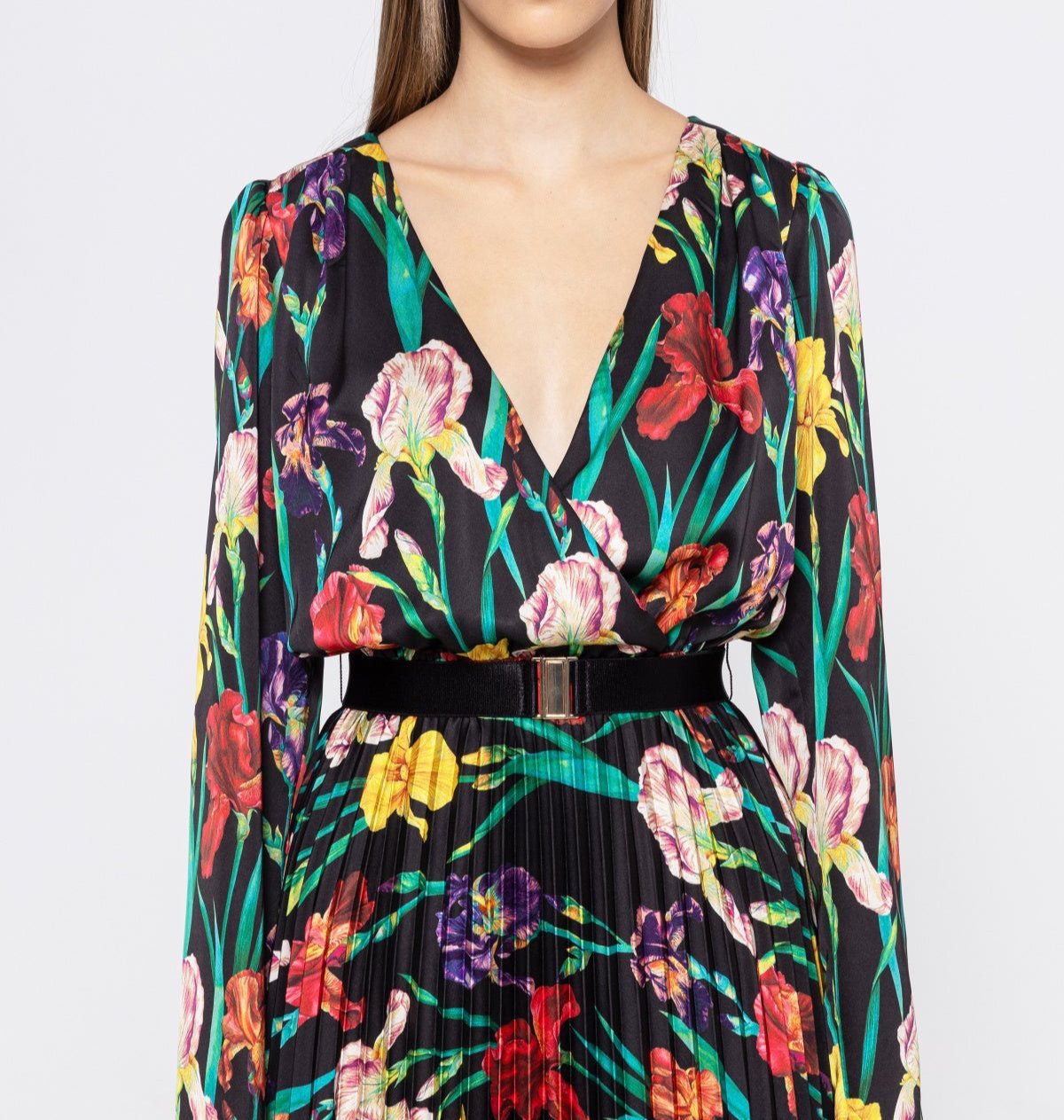 Close‑up of surplice V bodice showing multicolor iris print on satin and waist belt