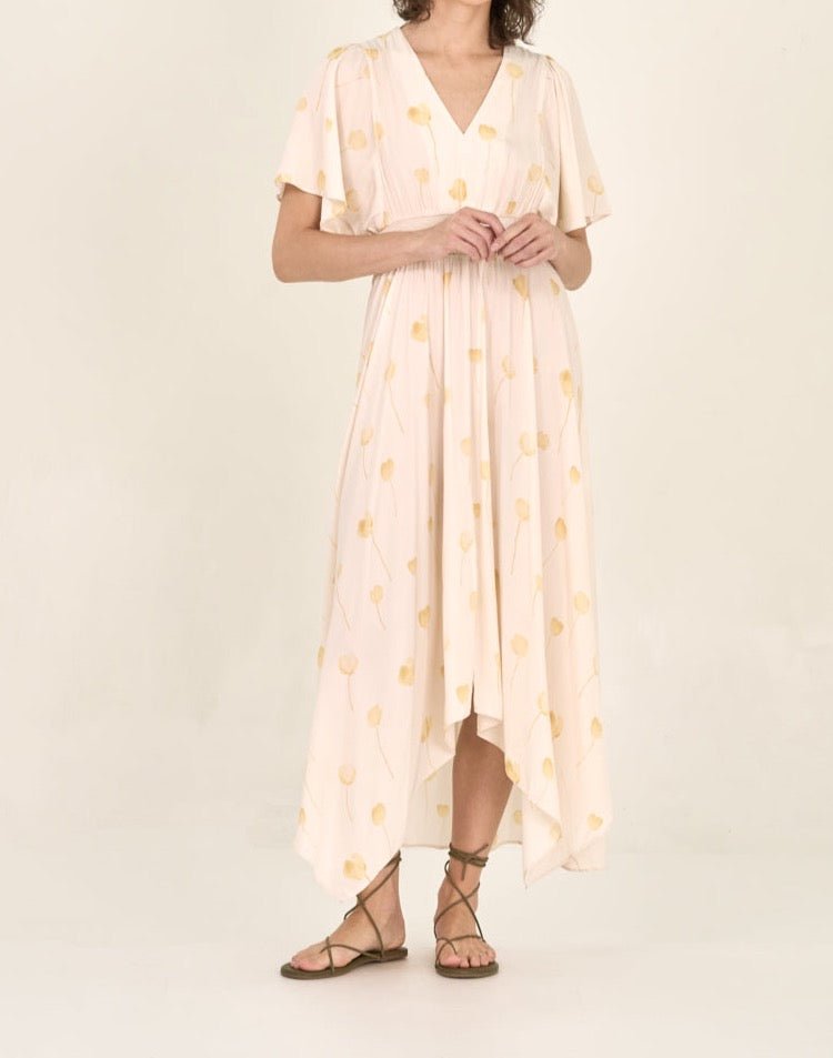 Front angled view of watercolor floral print maxi dress with split V-neck