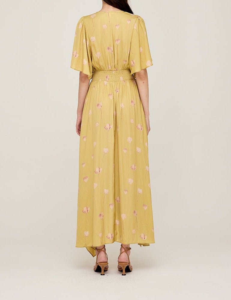 Back view of butter yellow flutter sleeve maxi dress