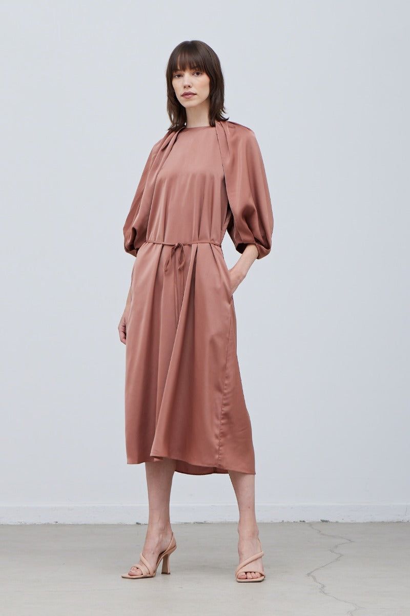 Front full view of Rose Tan satin midi dress with 3/4 sleeves and waist tie