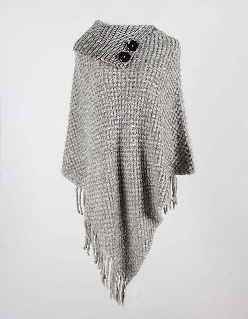 Fringe accents on cozy wool poncho
