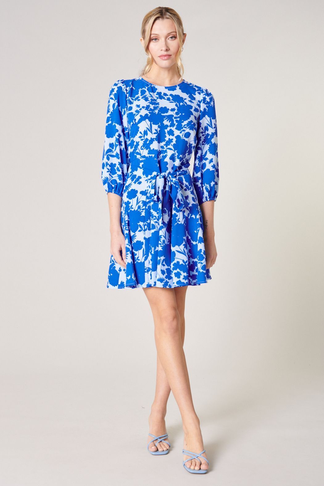 Blue floral mini dress with balloon sleeves and flared skirt front view