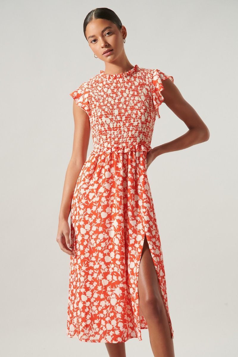 Red floral smocked midi dress with feminine flowing skirt and front slit