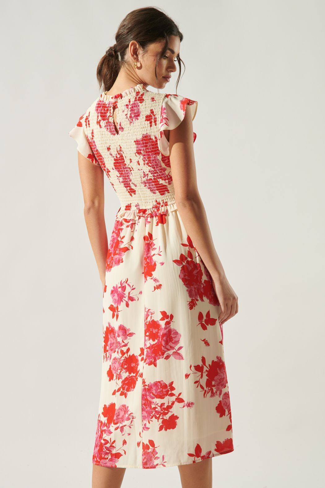 Back view of crimson floral midi dress with smocked back bodice and keyhole detail